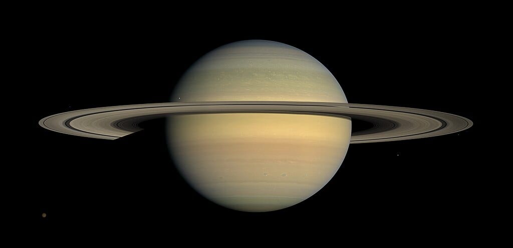 Saturn during Equinox (Cassini, 2009) by NASA / JPL / Space Science Institute (Cassini) — PUBLIC DOMAIN via nasa